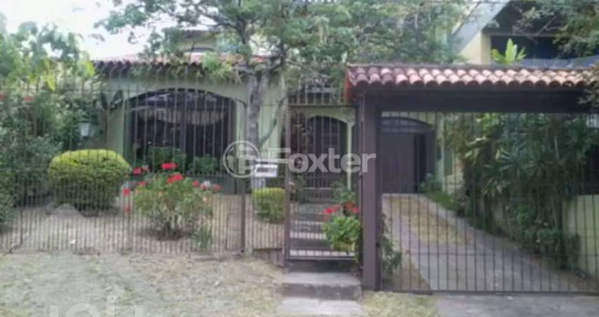 Casa com 4 quartos à venda na Rua Comandai, 560, Cristal, Porto Alegre