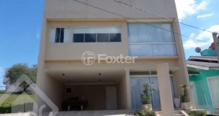 Casa em condomínio fechado com 4 quartos à venda na Rua Arahy Borges Ortiz, 30, Mário Quintana, Porto Alegre