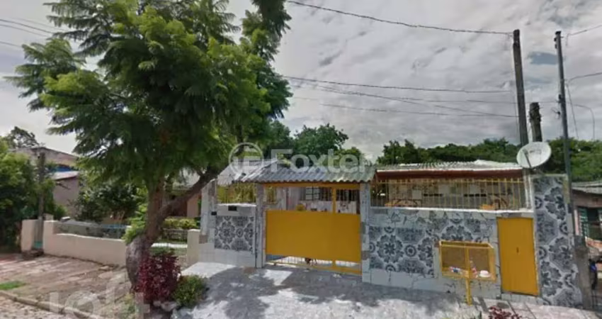 Casa com 4 quartos à venda na Rua Professor Rubens Guelli, 80, Vila Nova, Porto Alegre