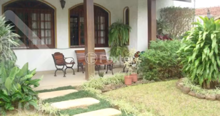 Casa com 4 quartos à venda na Rua Olécio Cavedini, 185, Espírito Santo, Porto Alegre