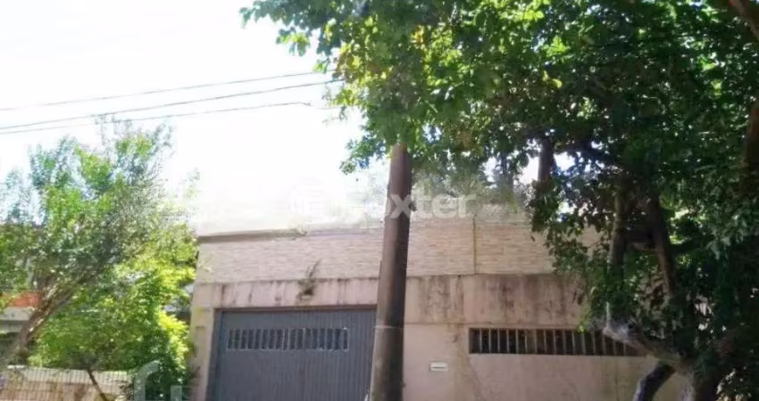 Casa com 4 quartos à venda na Rua Felipe Becker, 411, Três Figueiras, Porto Alegre