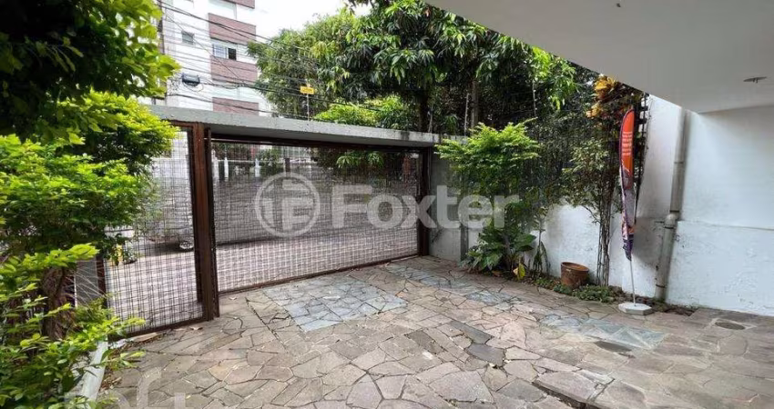 Casa com 3 quartos à venda na Rua Miguel Tostes, 736, Rio Branco, Porto Alegre