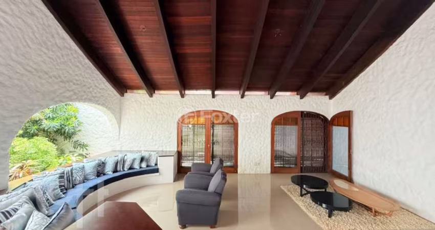 Casa com 3 quartos à venda na Rua Padre João Batista Reus, 257, Vila Conceição, Porto Alegre