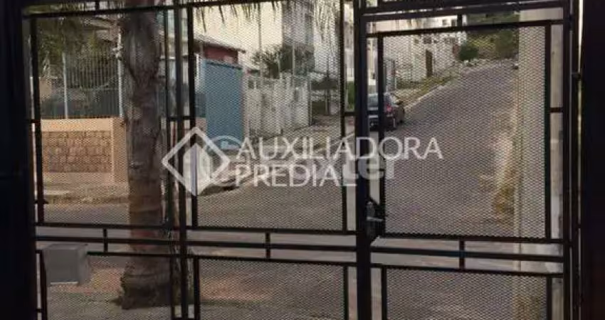 Casa com 3 quartos à venda na Rua Irmão Jaime Biazus, 43, Guarujá, Porto Alegre