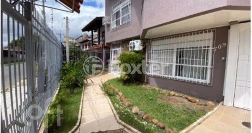 Casa com 4 quartos à venda na Travessa Kuluene, 309, Coronel Aparício Borges, Porto Alegre