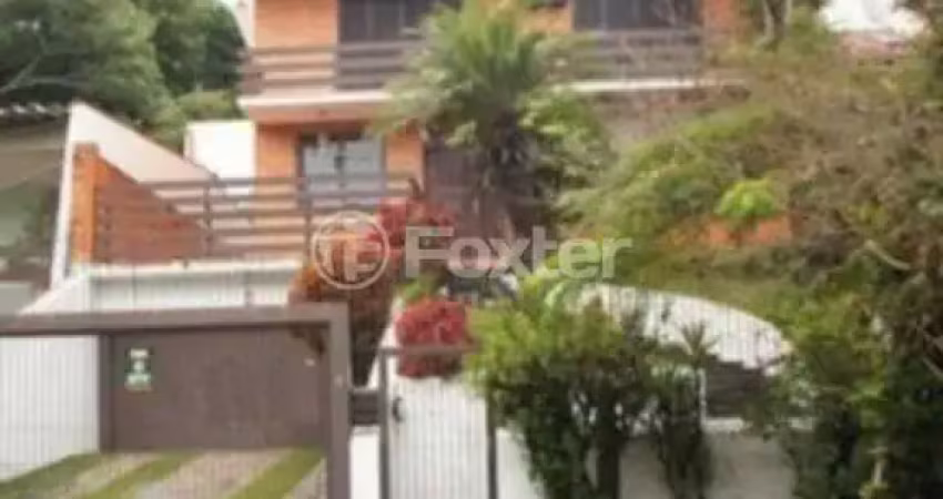 Casa com 3 quartos à venda na Avenida Fábio Araújo Santos, 1650, Nonoai, Porto Alegre