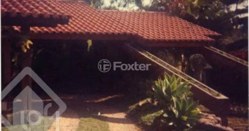 Casa com 3 quartos à venda na Avenida Desembargador Mello Guimarães, 260, Belém Novo, Porto Alegre