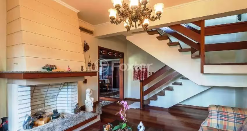 Casa com 3 quartos à venda na Rua Chico Pedro, 152, Camaquã, Porto Alegre
