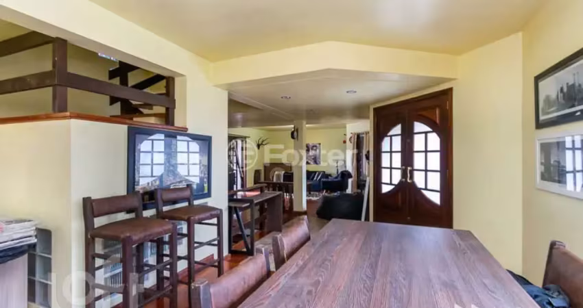 Casa com 3 quartos à venda na Rua Doutor Ney Cabral, 427, Nonoai, Porto Alegre