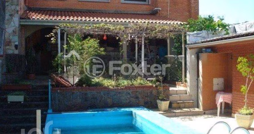Casa com 3 quartos à venda na Rua Dona Firmina, 1660, Vila São José, Porto Alegre