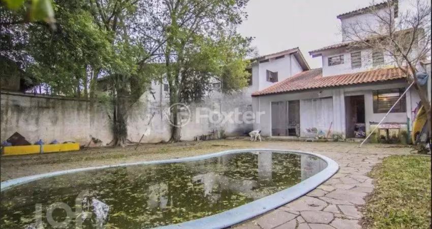 Casa com 4 quartos à venda na Rua Manoel Leão, 45, Pedra Redonda, Porto Alegre