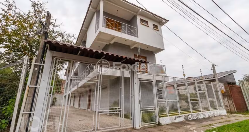 Casa em condomínio fechado com 3 quartos à venda na Rua Jamil Antônio José, 46, Nonoai, Porto Alegre