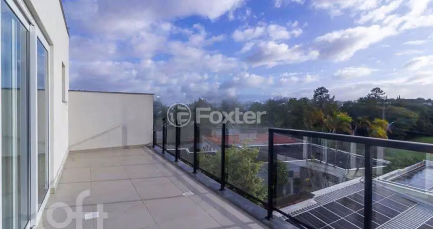 Casa em condomínio fechado com 3 quartos à venda na Avenida Pereira Passos, 695, Vila Assunção, Porto Alegre