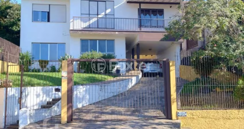 Casa com 3 quartos à venda na Rua Tristão de Alencar, 553, Primavera, Novo Hamburgo