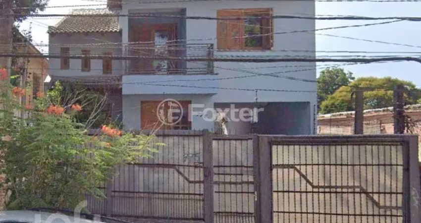 Casa com 3 quartos à venda na Rua Humberto de Campos, 775, Partenon, Porto Alegre