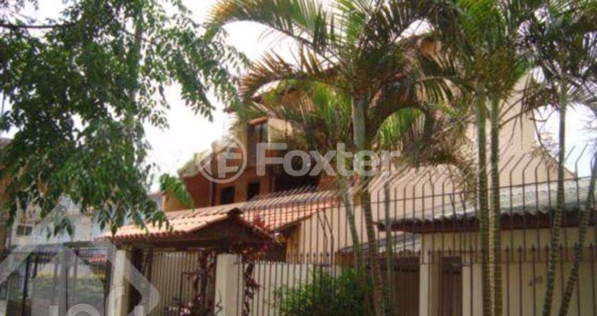 Casa com 3 quartos à venda na Rua Butuí, 480, Cristal, Porto Alegre