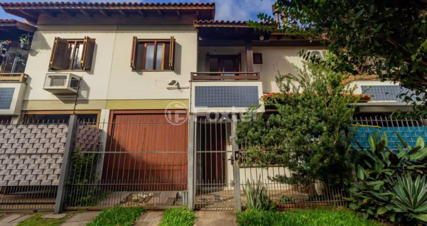 Casa em condomínio fechado com 3 quartos à venda na Rua Itapitocaí, 1031, Cristal, Porto Alegre