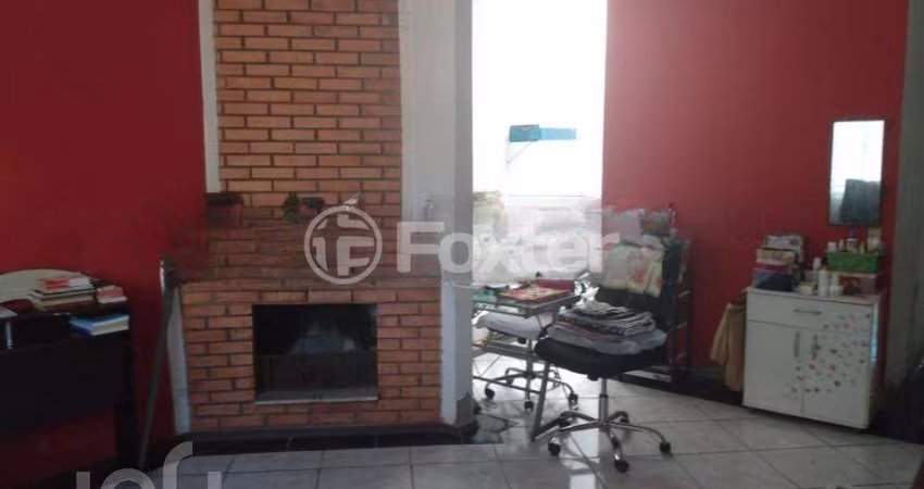 Casa com 3 quartos à venda na Rua Mata Coelho, 398, Nonoai, Porto Alegre