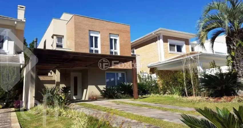 Casa em condomínio fechado com 3 quartos à venda na Avenida Juca Batista, 8000, Belém Novo, Porto Alegre