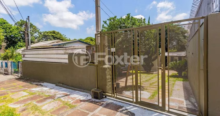 Casa com 3 quartos à venda na Rua Augusto Attílio Giordani, 50, São Sebastião, Porto Alegre