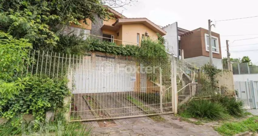 Casa com 3 quartos à venda na Rua Osmar Amaro de Freitas, 71, Jardim Itu Sabará, Porto Alegre