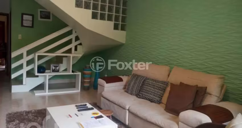 Casa em condomínio fechado com 3 quartos à venda na Avenida Orleaes, 105, Guarujá, Porto Alegre
