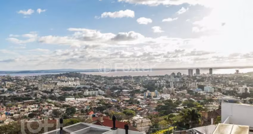 Casa em condomínio fechado com 5 quartos à venda na Rua Alcebíades Antônio dos Santos, 356, Nonoai, Porto Alegre