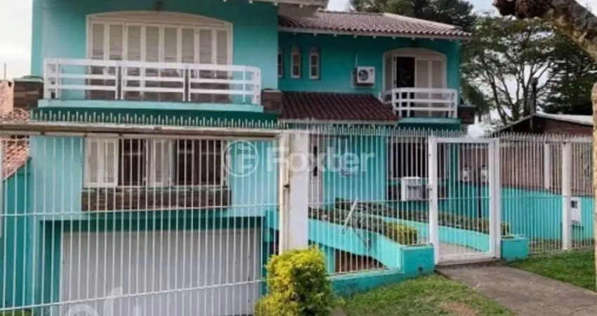 Casa com 4 quartos à venda na Rua Felipe Becker, 88, Três Figueiras, Porto Alegre
