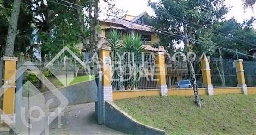 Casa com 4 quartos à venda na Avenida Coronel Marcos, 96, Pedra Redonda, Porto Alegre