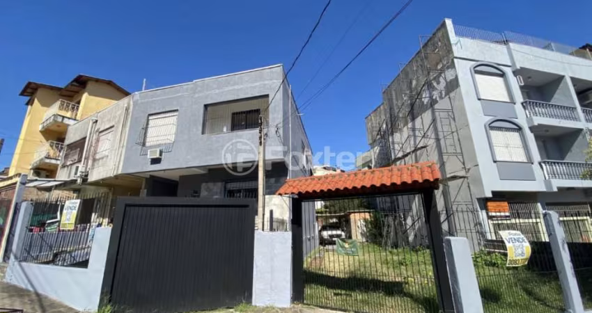 Casa com 4 quartos à venda na Rua Doutor Ney Cabral, 145, Nonoai, Porto Alegre
