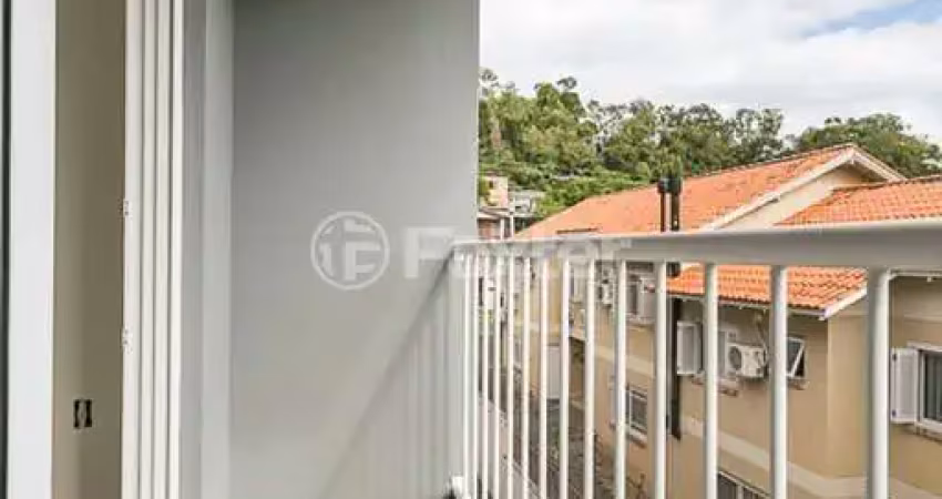 Casa em condomínio fechado com 3 quartos à venda na Rua Padre João Batista Reus, 2754, Camaquã, Porto Alegre