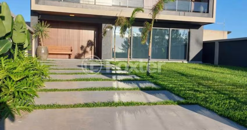 Casa com 4 quartos à venda na Avenida Beira Mar, 209, Arroio Teixeira, Capão da Canoa