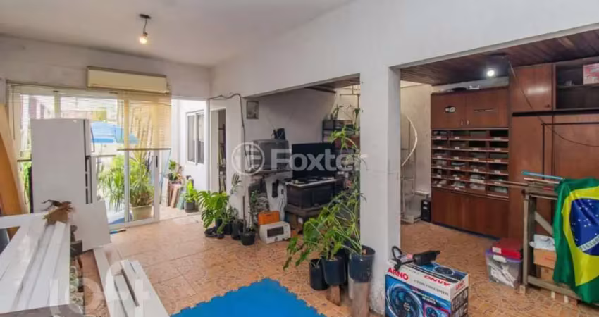 Casa com 4 quartos à venda na Rua Evaristo da Veiga, 341, Partenon, Porto Alegre