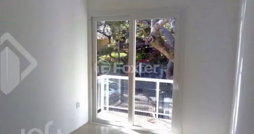 Casa em condomínio fechado com 3 quartos à venda na Rua Jacundá, 80, Guarujá, Porto Alegre