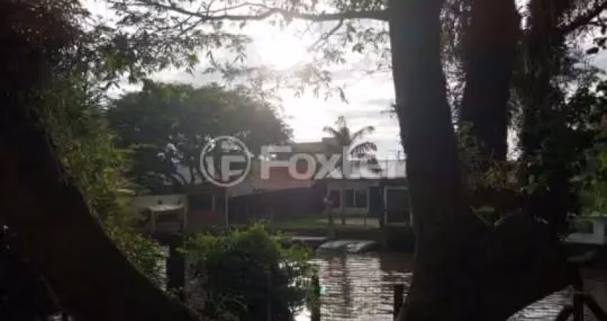 Casa com 3 quartos à venda na Rua Mexiana, 435, Arquipélago, Porto Alegre