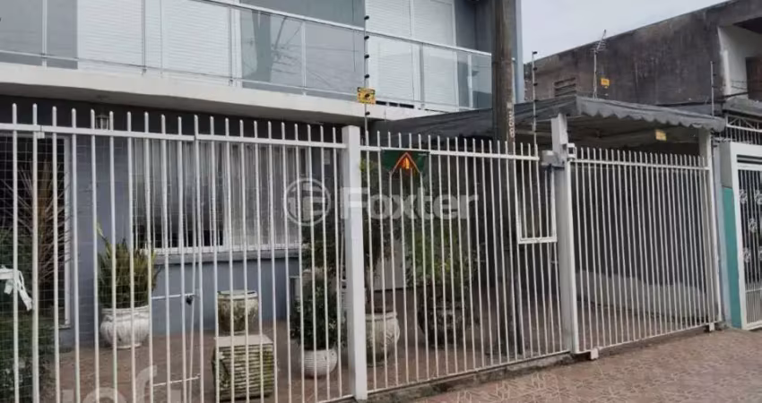 Casa com 4 quartos à venda na Rua Sérgio Porto, 308, Farrapos, Porto Alegre