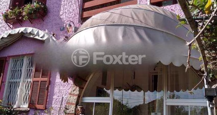 Casa com 5 quartos à venda na Rua Januário Scalzilli, 322, Santa Tereza, Porto Alegre