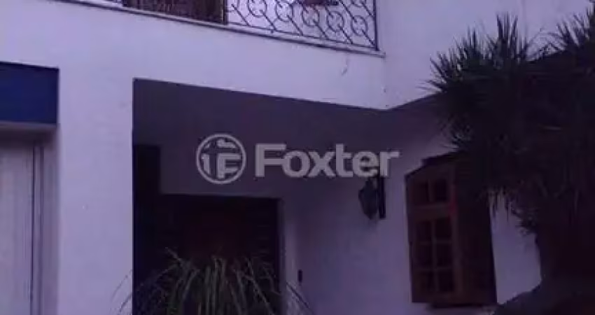 Casa com 4 quartos à venda na Rua Trujilo, 115, Jardim Lindóia, Porto Alegre