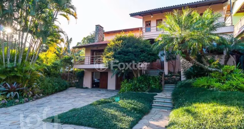Casa em condomínio fechado com 5 quartos à venda na Avenida Firmino Octávio Bimbi, 255, Cavalhada, Porto Alegre