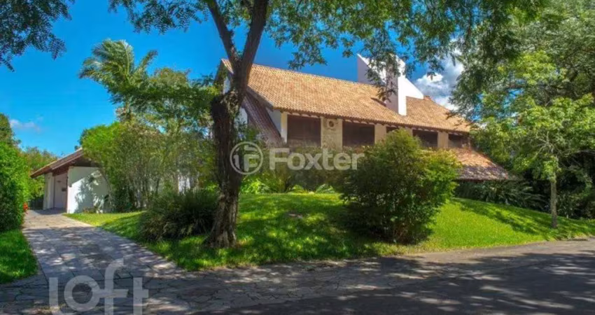 Casa com 6 quartos à venda na Avenida da Cavalhada, 5205, Cavalhada, Porto Alegre