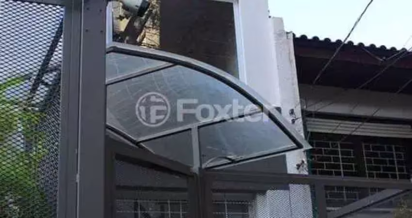 Casa com 5 quartos à venda na Travessa Saúde, 50, Auxiliadora, Porto Alegre