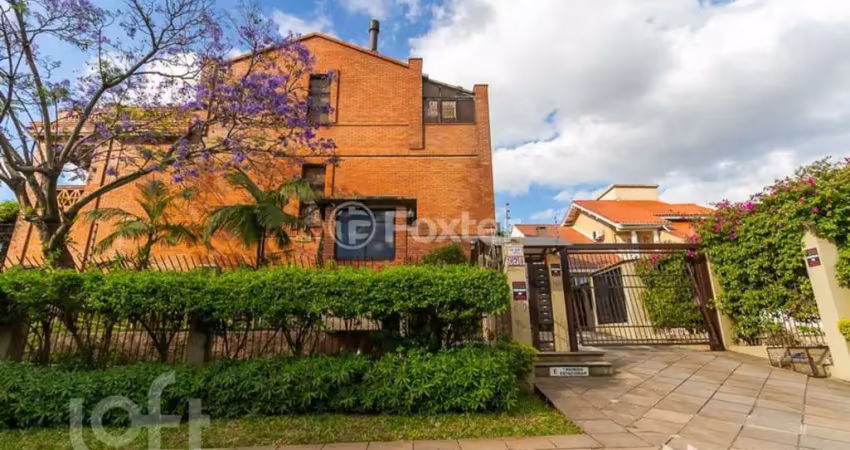 Casa em condomínio fechado com 3 quartos à venda na Avenida Jacuí, 978, Cristal, Porto Alegre