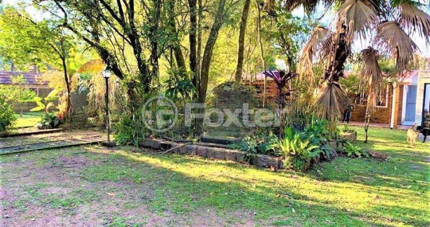 Casa com 4 quartos à venda na Avenida Desembargador Mello Guimarães, 235, Belém Novo, Porto Alegre