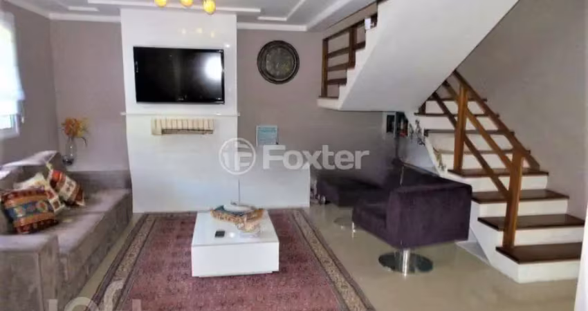 Casa com 3 quartos à venda na Rua Henrique Anawate, 590, Guarujá, Porto Alegre