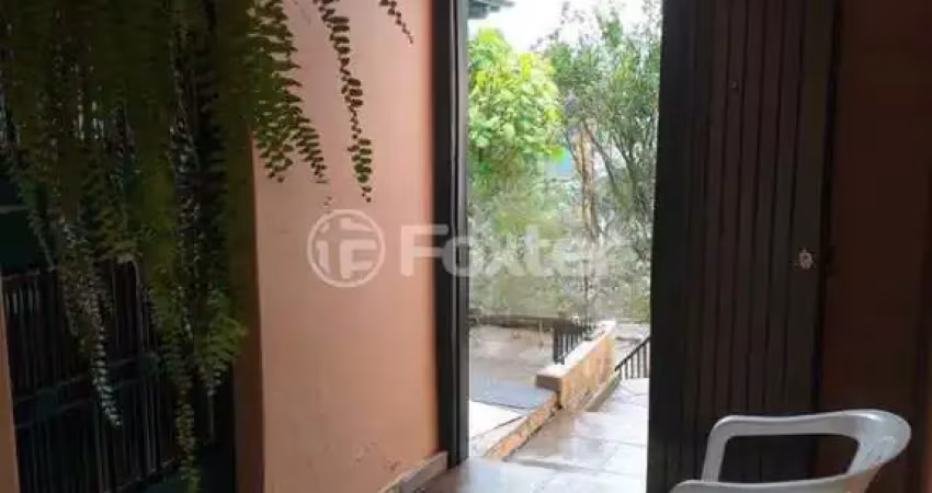 Casa com 2 quartos à venda na Rua Doze de Outubro, 607, Partenon, Porto Alegre