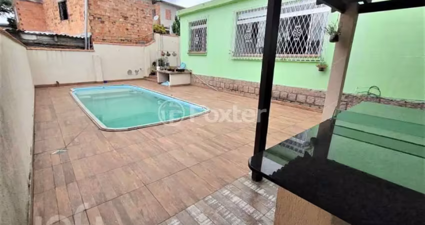 Casa com 3 quartos à venda na Rua Humberto de Campos, 630, Partenon, Porto Alegre