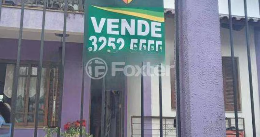 Casa com 4 quartos à venda na Rua Pinto da Rocha, 426, Partenon, Porto Alegre