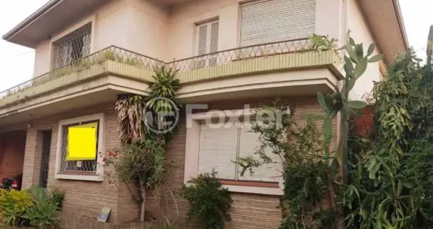 Casa com 8 quartos à venda na Travessa Comandante Gustavo Cramer, 85, Jardim Lindóia, Porto Alegre