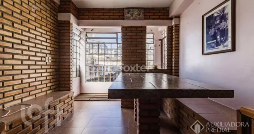 Casa com 3 quartos à venda na Avenida Mariland, 30, Auxiliadora, Porto Alegre