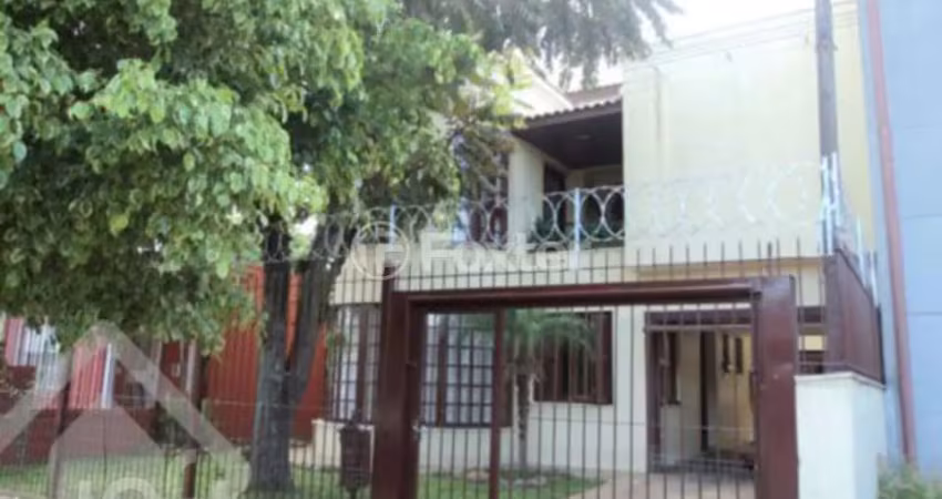 Casa com 3 quartos à venda na Rua Vítor Valpírio, 240, Anchieta, Porto Alegre